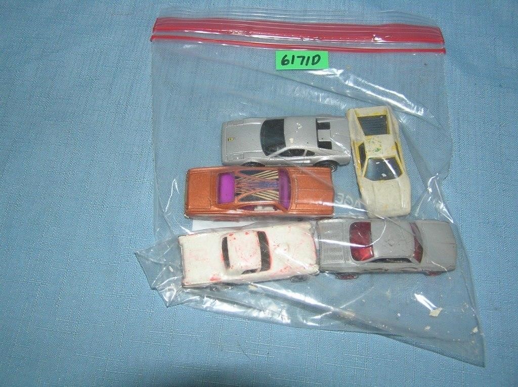 Bag lot of vintage die cast vehicles