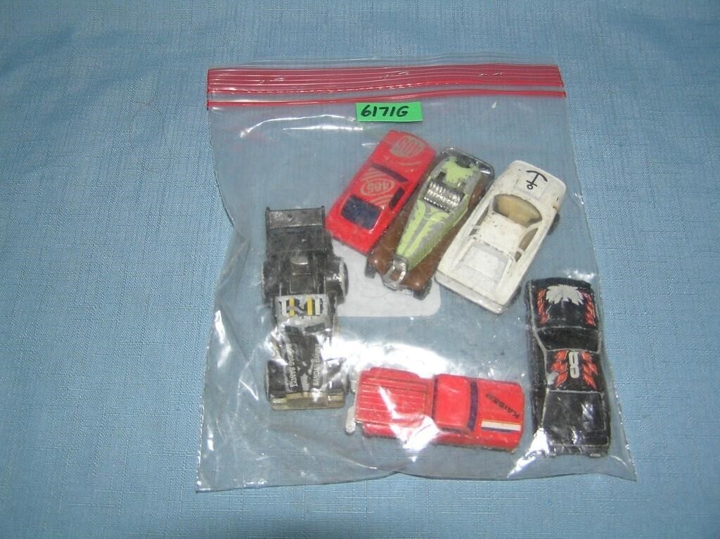 Bag lot of vintage die cast vehicles