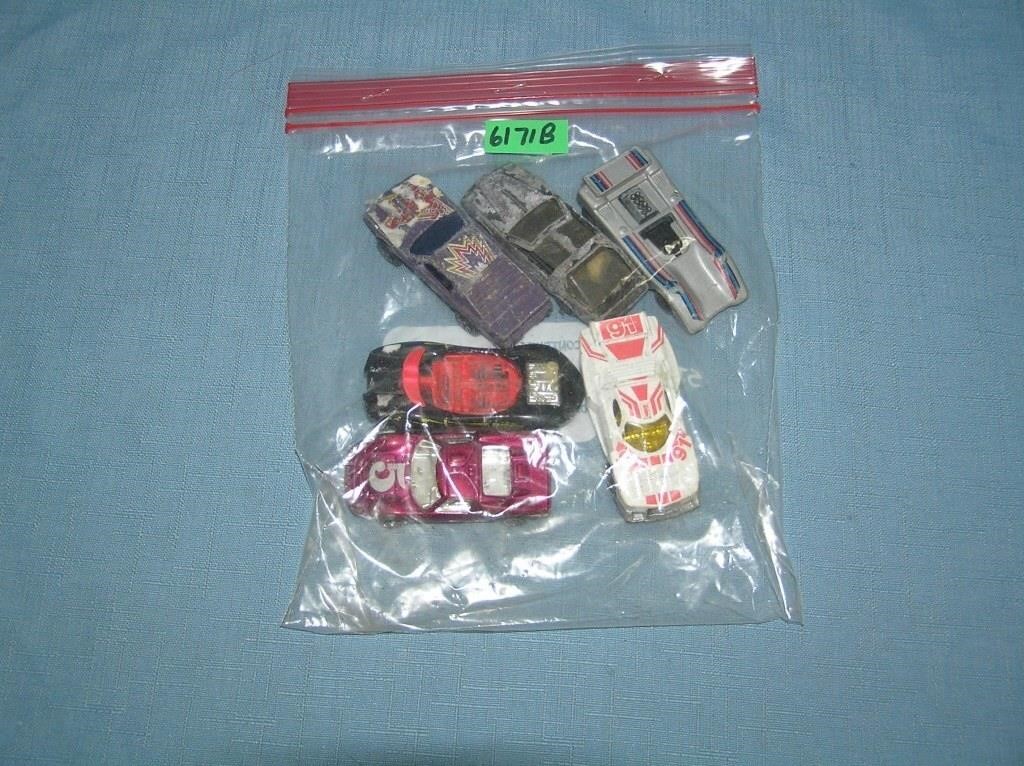 Bag lot of vintage die cast vehicles