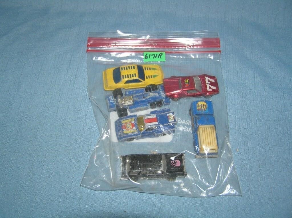 Bag lot of vintage die cast vehicles