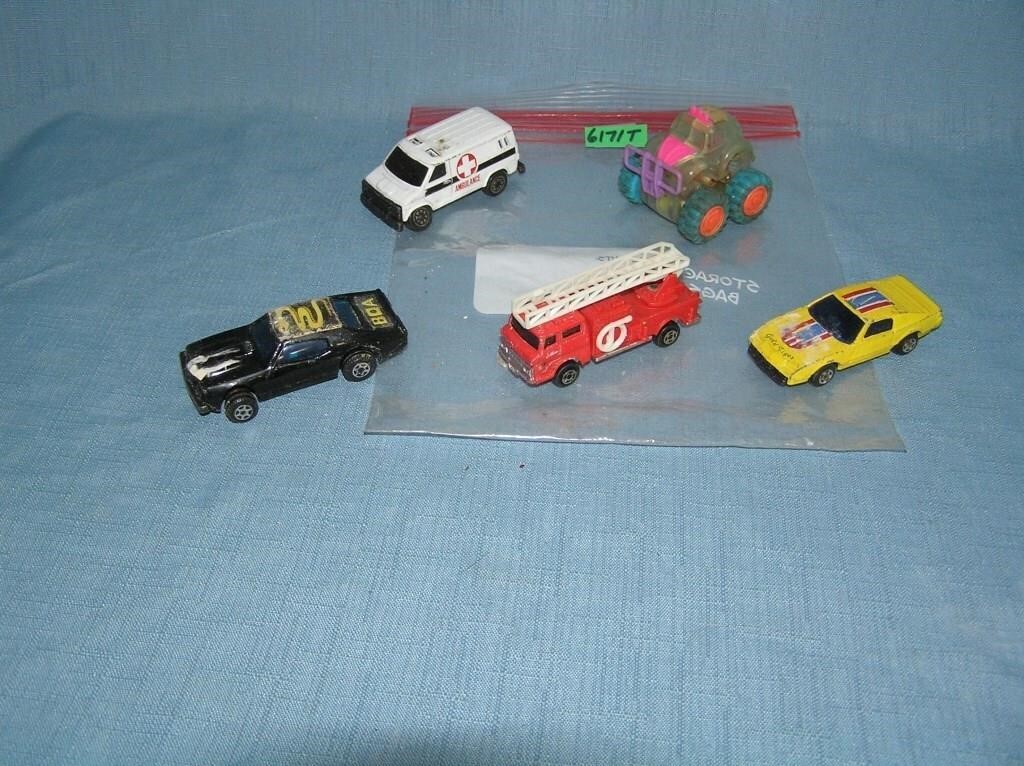 Bag lot of vintage die cast vehicles