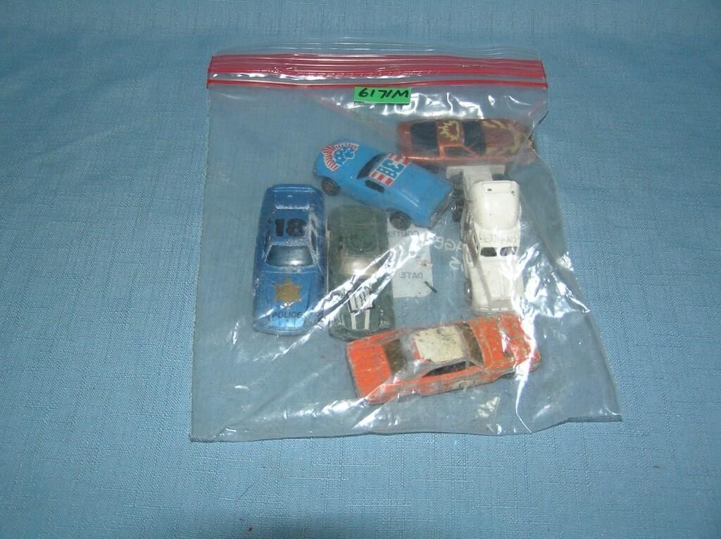 Bag lot of vintage die cast vehicles