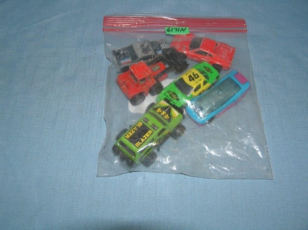 Bag lot of vintage die cast vehicles