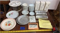 Kitchen: 6 bred loaf tubes, pie plates, dishes,