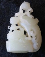 Chinese white russet jade carving of a bird