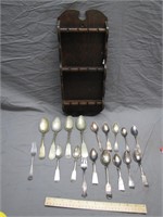 Vintage Collectible Spoons in Display Cabinet