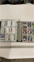Football trading cards in binder