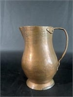 Vintage hammered copper pitcher