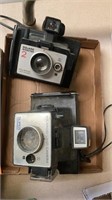 2 vintage polarized cameras