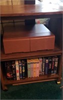 TV stand and contents (VHS tapes)