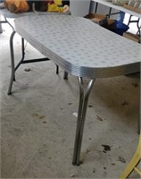 Vintage metal table approx size is 47 x 30 top