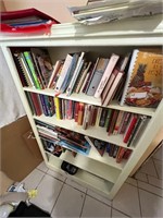 Three shelves of cookbooks