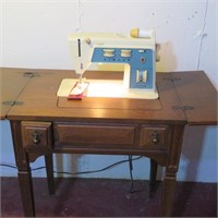 Singer Touch & Sew Sewing Machine in cabinet