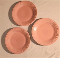 three pink Feista Dinner plates