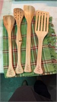 Wooden cooking spoons and towel