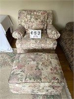 Flex steel floral pattern chair with ottoman.