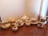 Teacups & saucers, sugar dispenser & more