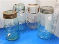 4 GLASS JARS WITH LIDS - 2 CROWN, 1 LIGHTNING,