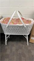 Vintage standing bassinet with carry handles and