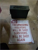 No trespassing sign and metal ammo box