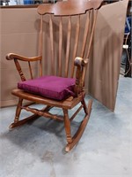 Wooden rocking chair..