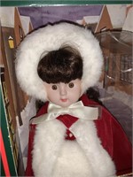 PORCELAIN HOLIDAY DOLL, FROM 1989. 17" TALL IN