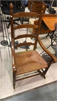 Vintage ladder back rocking chair/arm chair with