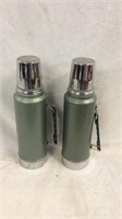 Two Stanley thermos