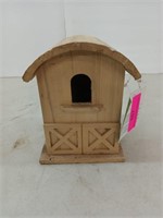 Unfinished wood birdhouse is ready for your