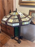 Art deco style lamp with leaded glass shade