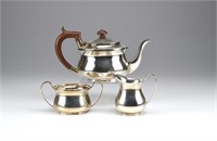 Three piece English silver tea set