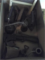 Box of antiques, washboard, irons, pipe wrenches