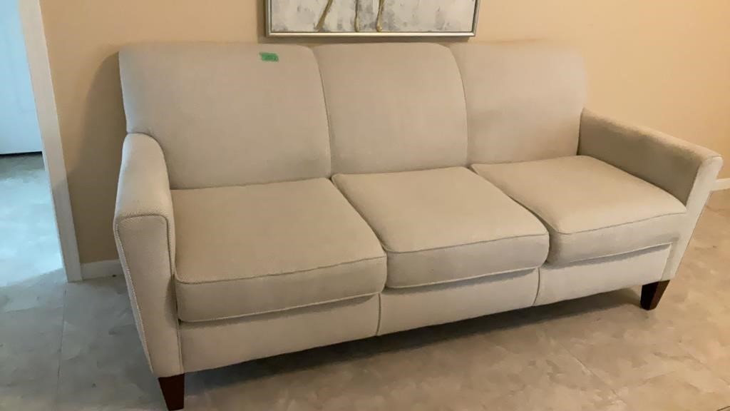 Cream colored couch, (arms a little dirty)