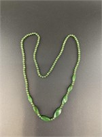 Alaskan Kobuk jade bead necklace. Each bead shows