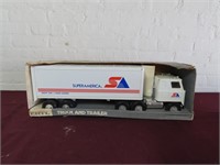 New Ertl Super America Truck & trailer in box.