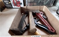 Hatchet, pipe wrench, flat bar and more.