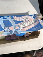 Hot wheels motorized racer -  box with a lot of