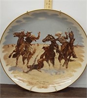 Aiding a Comrade collectible plate. Artist