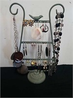 Earring display with earrings and necklaces