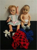 Vintage baby dolls with clothing