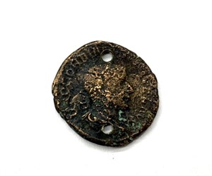 Ancient Coin
(Holes drilled) (cannot guarantee