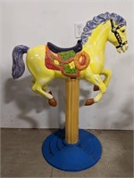 Carousel style horse. Ceramic top and metal base.