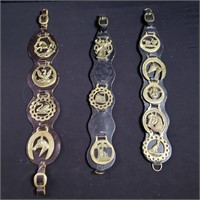 Group of leather-mounted horse brass