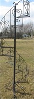 Eight tier spiral wrought iron plant stand.