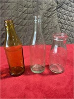 Milk bottle, Cleveland Ohio amber measure bottle