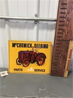 McCormick Deering tin sign, 14" x 11"