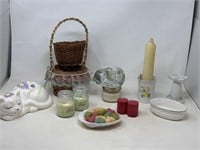 Assortment of decor, cat figurine, candles,