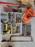 Reel tape measure, hammer, clippers, pliers,