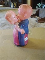 Celluloid Wind up Boy Kissing Girl Toy
