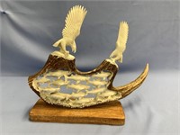 Stunning moose antler carving depicting eagles and